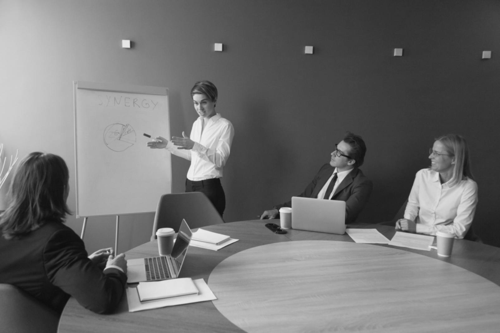 Writer working on story development with plot outline and character notes