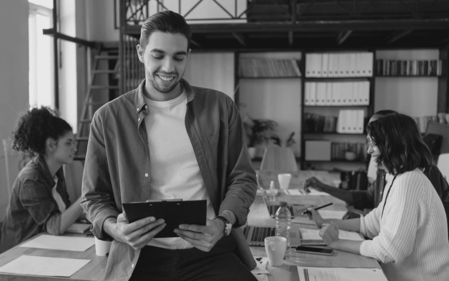 Detailed plot outline and character development charts spread across a desk
